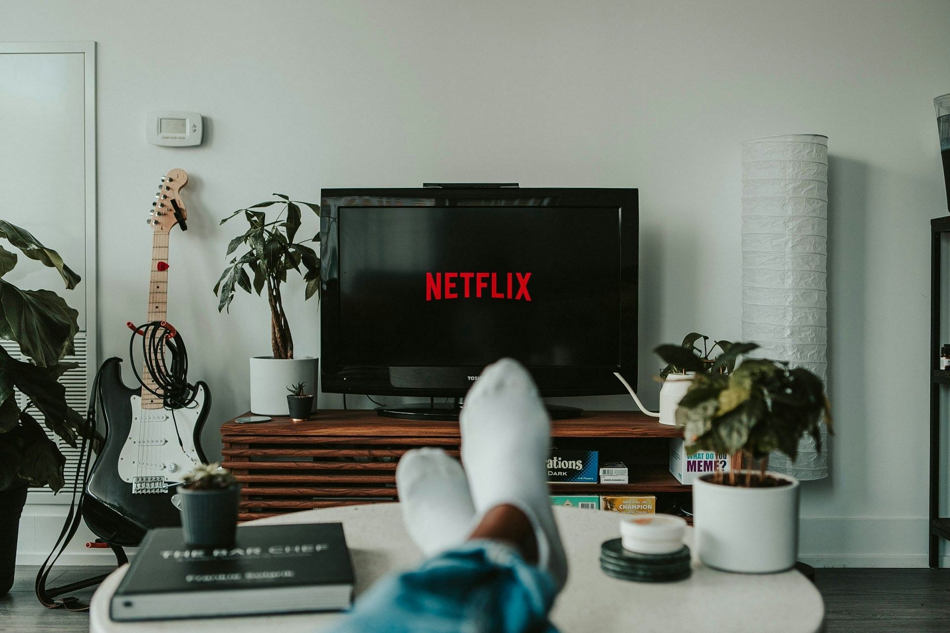 Watching movies linked with Nighttime Urination (Image via Unsplash /Mollie Sivaram)